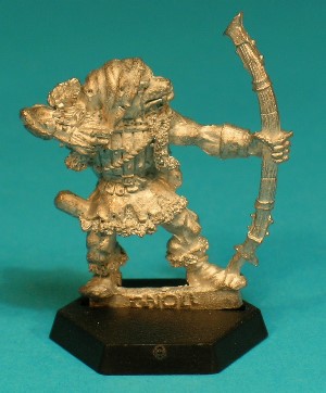 Pose 2, variant E. This variant wears a tatty hood with no patches. He has a dog-like face with a short muzzle, and a closed mouth with protruding fangs. His head is level and he looks along the line of his bow. He has no visible earrings.